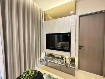 Modern living room with elegant marble accents and sleek design
