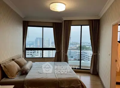 Spacious bedroom with city view and elegant decor in modern apartment