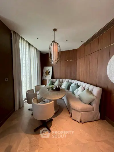 Luxurious modern living room with elegant decor and cozy seating area, perfect for relaxation and entertainment.