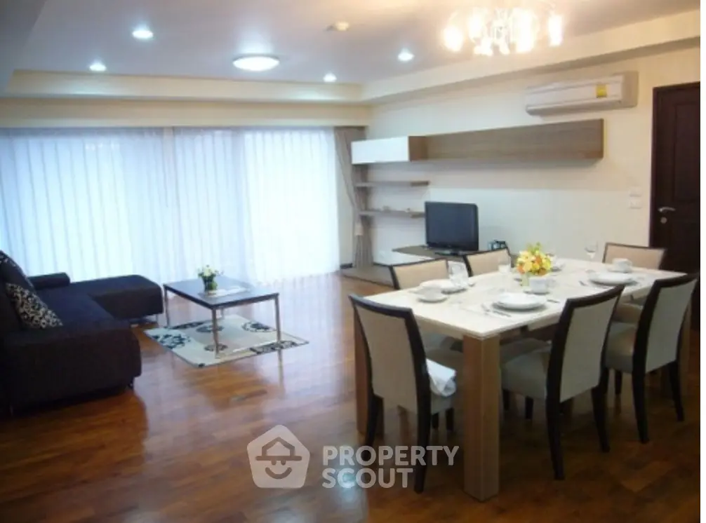 Spacious modern living room with dining area and elegant decor