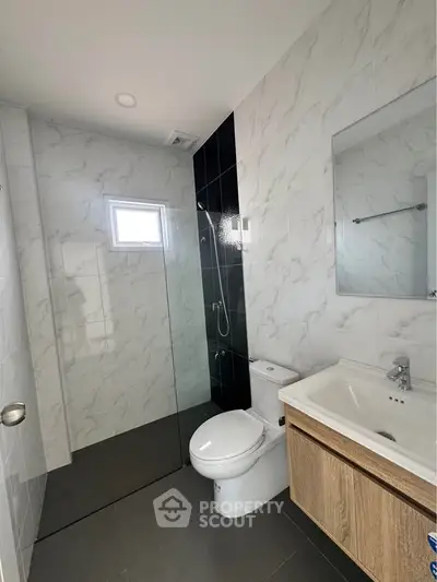 Modern bathroom with sleek design and marble tiles