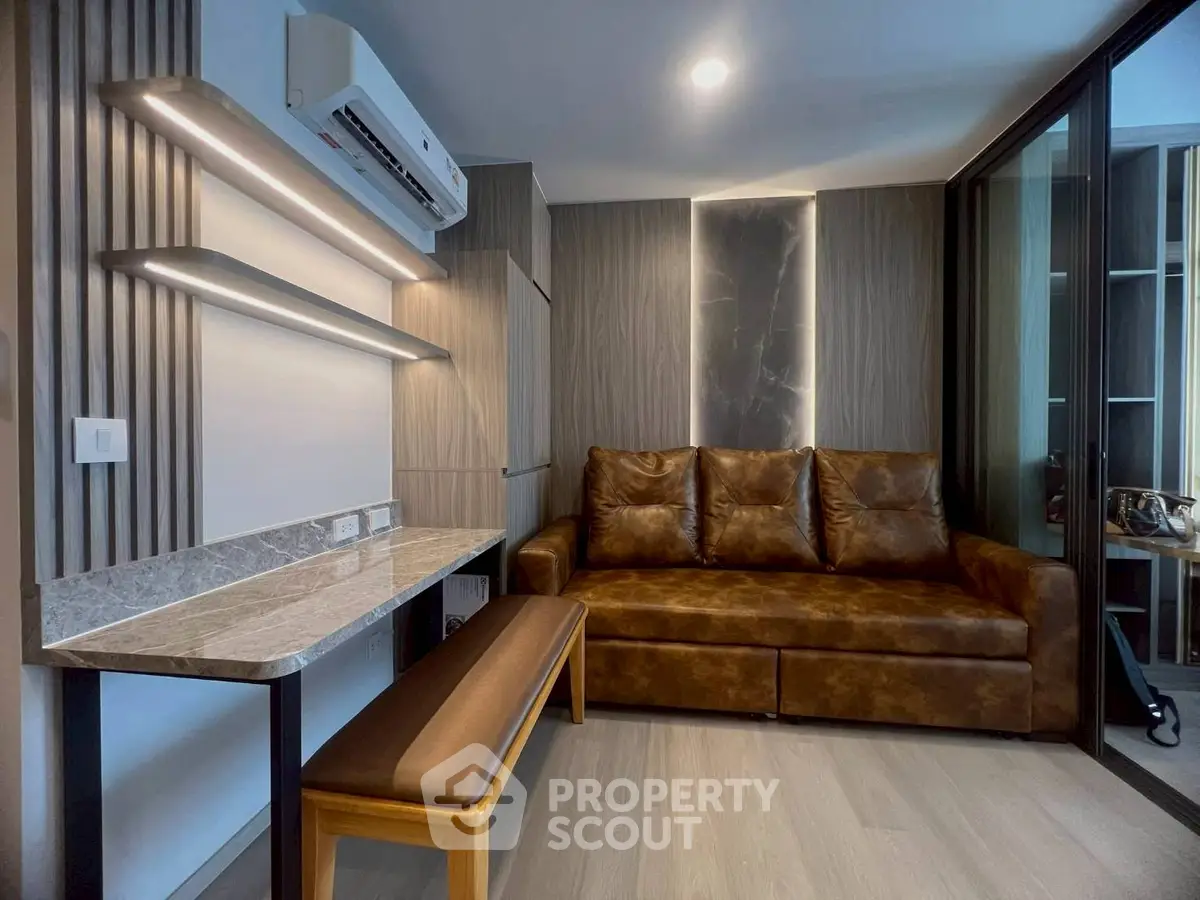 Modern living room with stylish sofa and sleek lighting