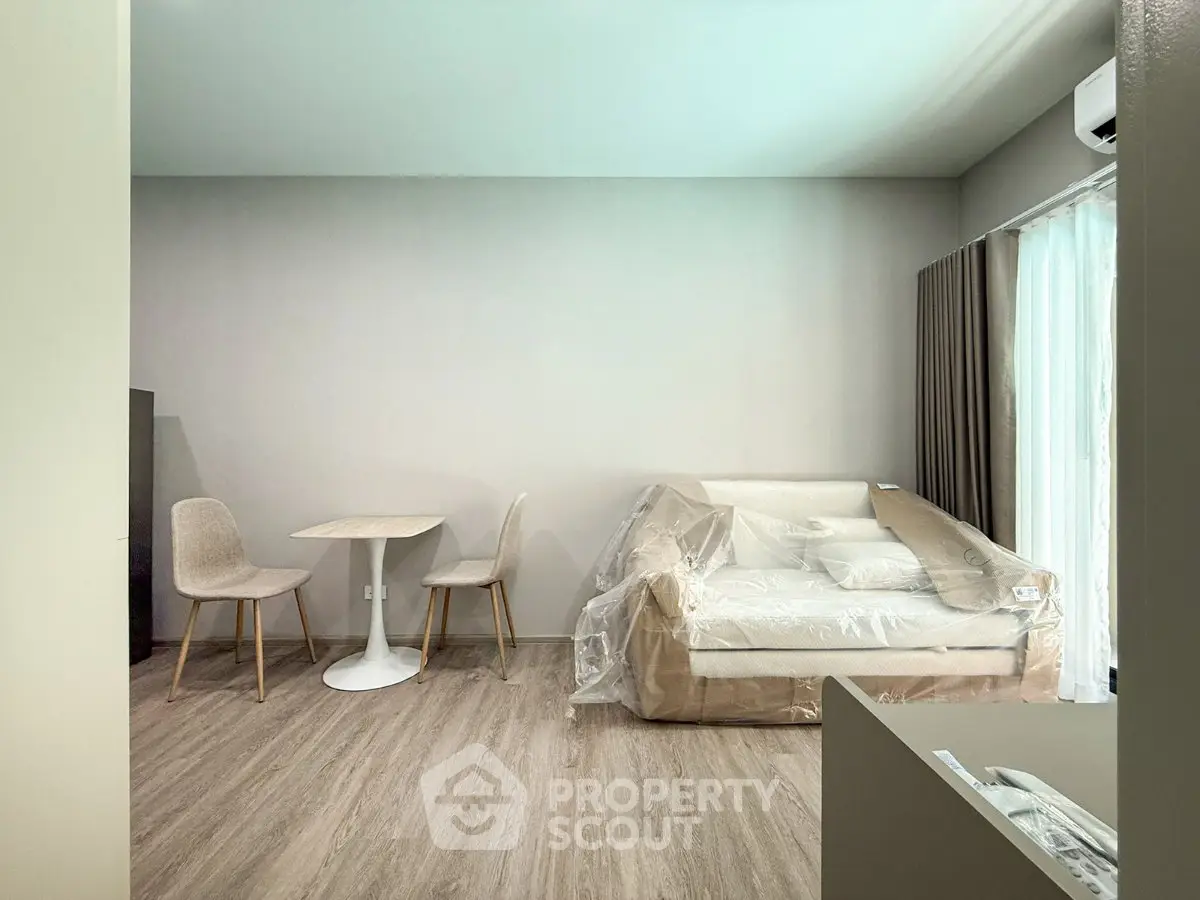 Modern living room with minimalist furniture and natural light