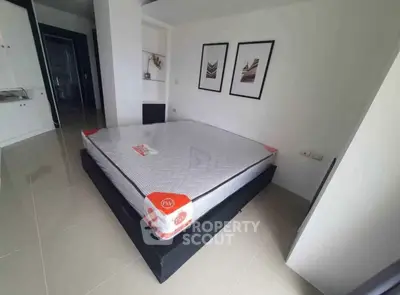 Modern bedroom with new mattress and stylish decor in a contemporary apartment.