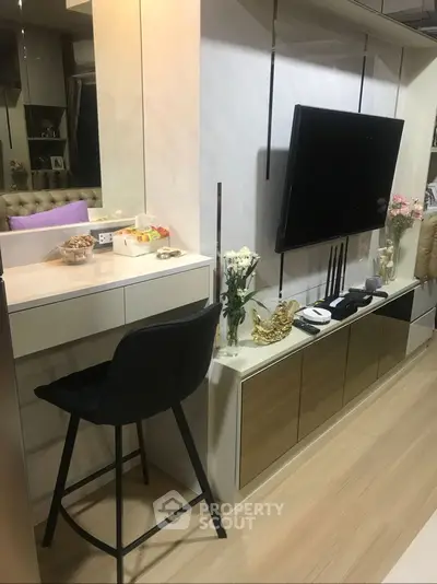 Modern living room with sleek TV setup and elegant decor