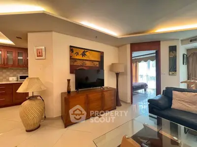 Spacious living room with modern decor and open layout in a stylish apartment.