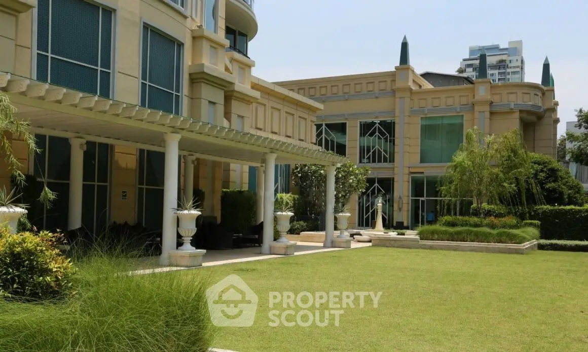 Luxurious modern building with lush garden and elegant architecture