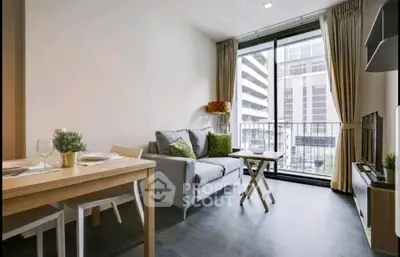 Modern living room with balcony view in urban apartment