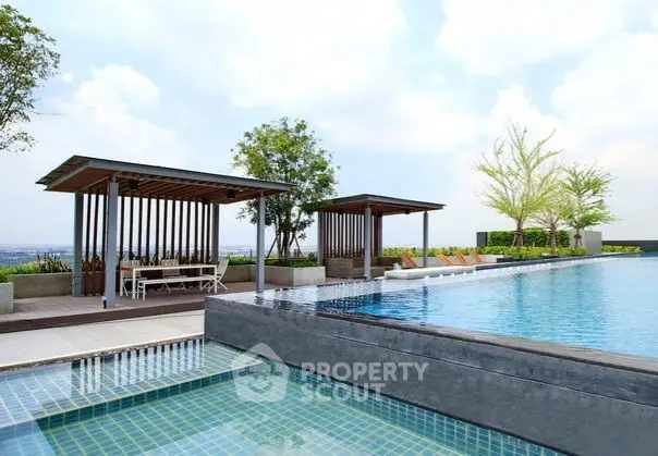 Luxurious rooftop pool with stunning city views and modern cabanas.