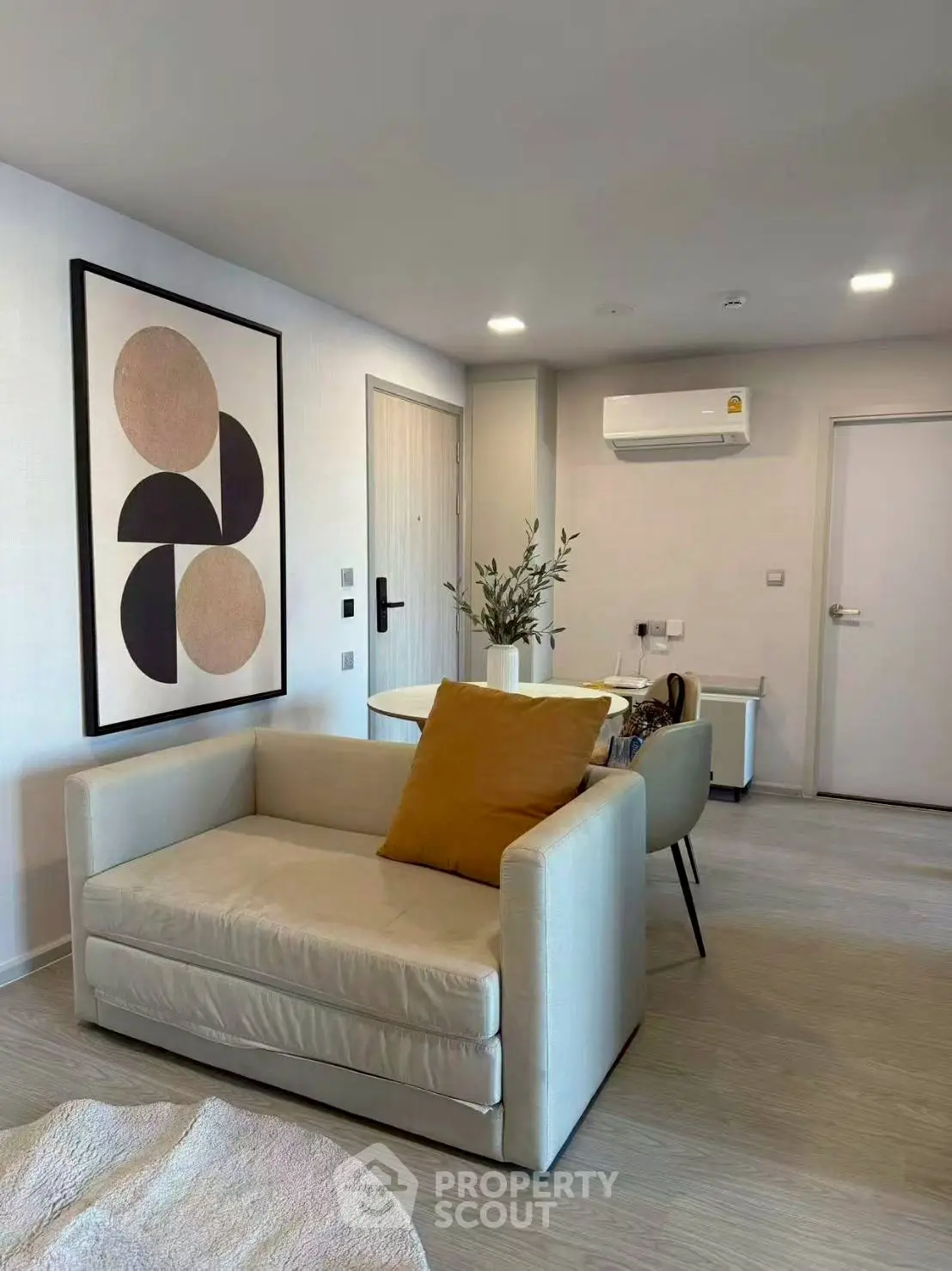 Modern living room with stylish decor and cozy seating area