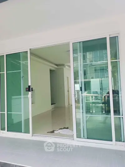 Modern apartment with sliding glass doors and spacious interior