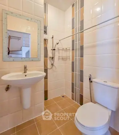 Modern bathroom with sleek fixtures and stylish tile design, perfect for a contemporary home.