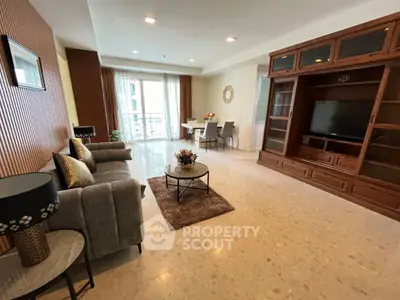Spacious living room with elegant decor and large TV unit, perfect for modern family living.