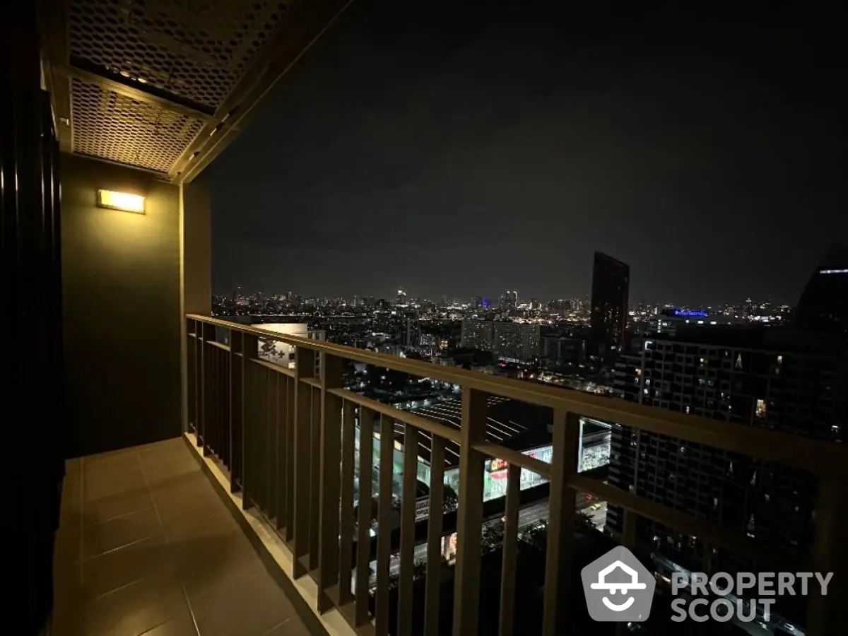 Stunning night cityscape view from high-rise balcony, perfect for urban living enthusiasts.