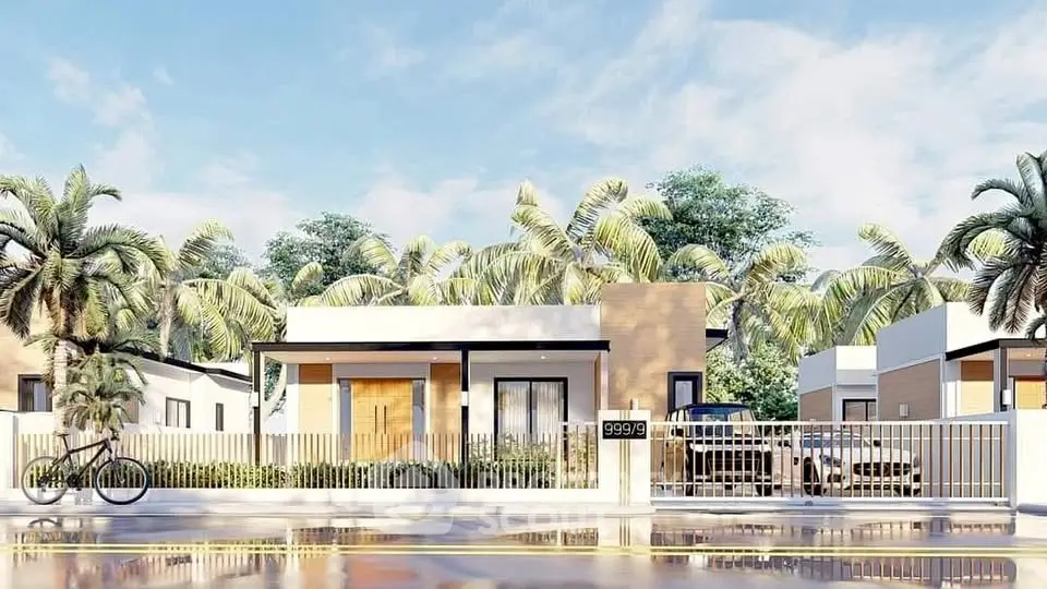 Modern tropical house with sleek design and lush palm trees