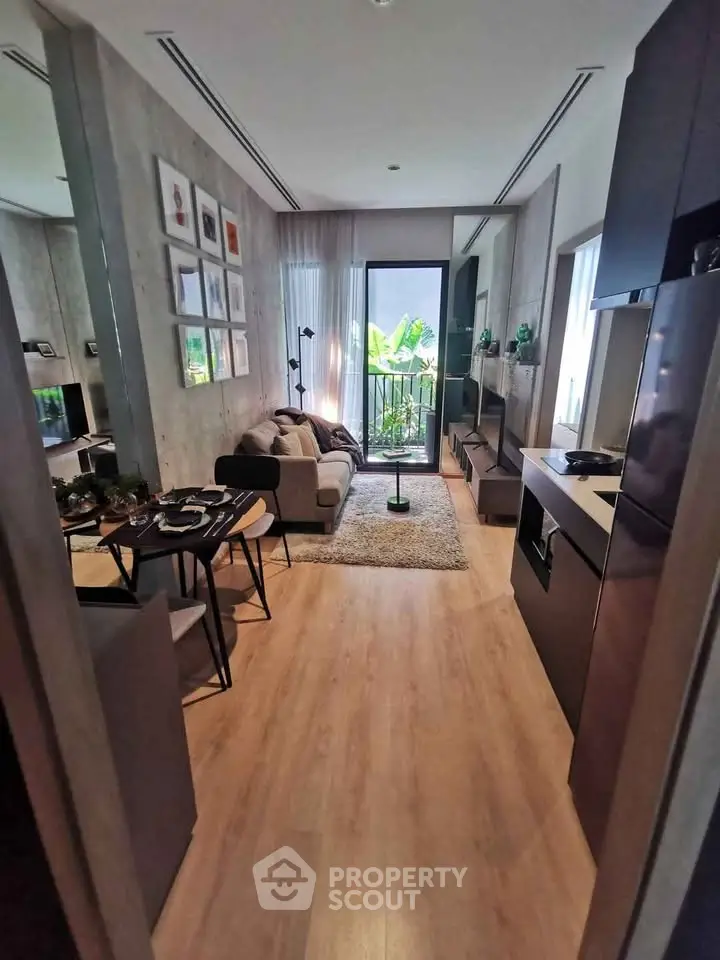 Modern living room with cozy decor and balcony view