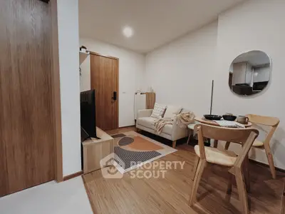 Cozy living room with modern decor and wooden flooring