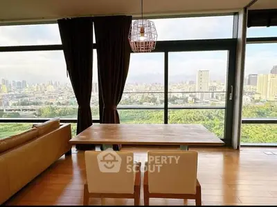 Stunning living room with panoramic city view and elegant decor