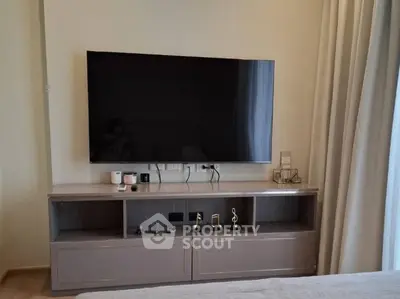 Modern living room with sleek TV setup and stylish decor