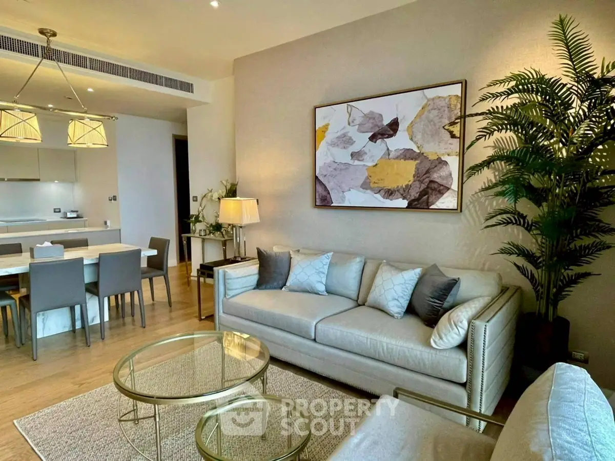Luxurious modern living room with elegant decor and open kitchen layout
