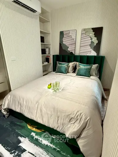 Luxurious bedroom with modern decor and plush bedding in elegant apartment