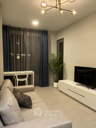 Modern living room with sleek furniture and stylish lighting