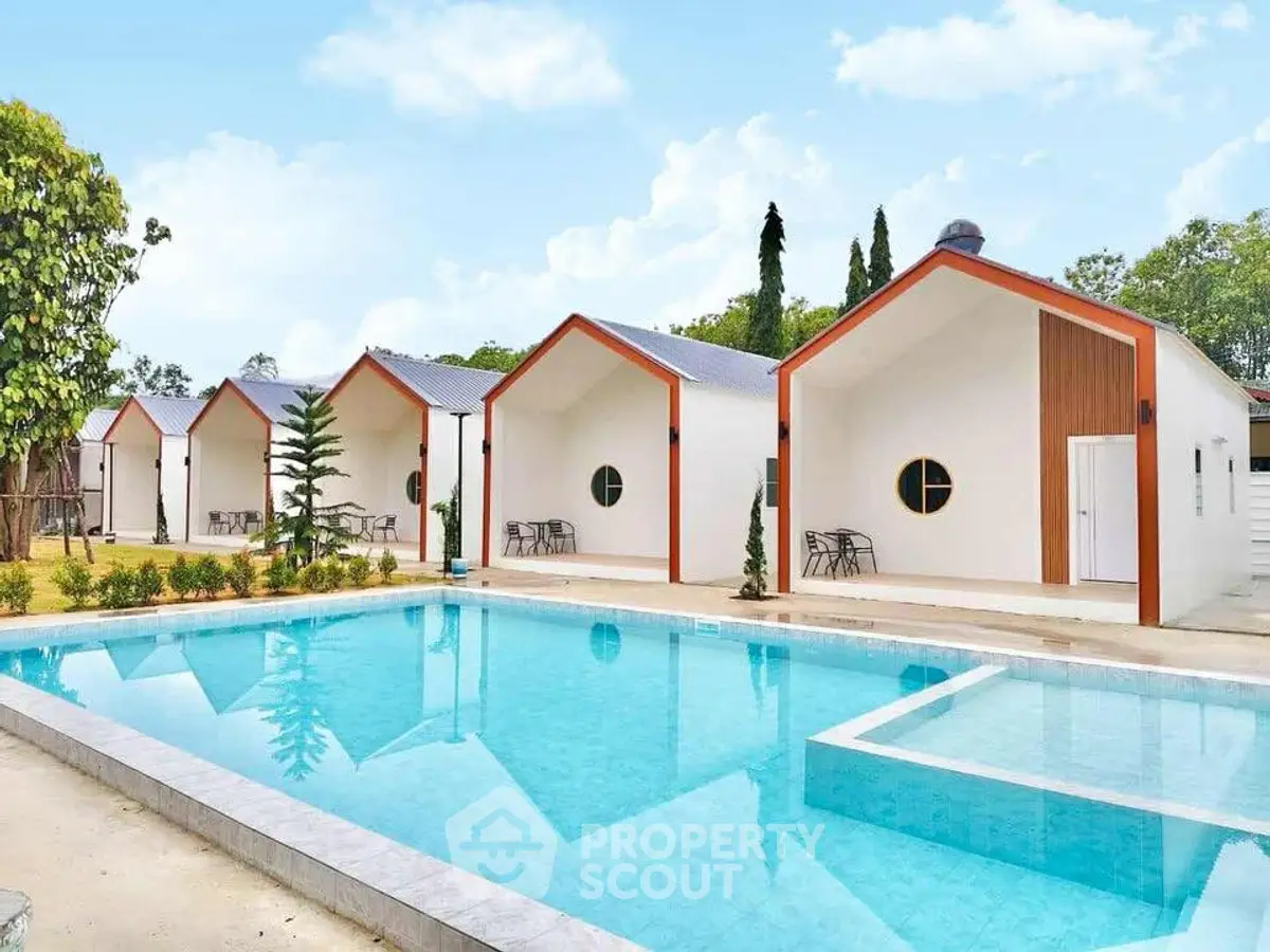 Charming modern villas with a pristine pool, perfect for luxurious living and relaxation.
