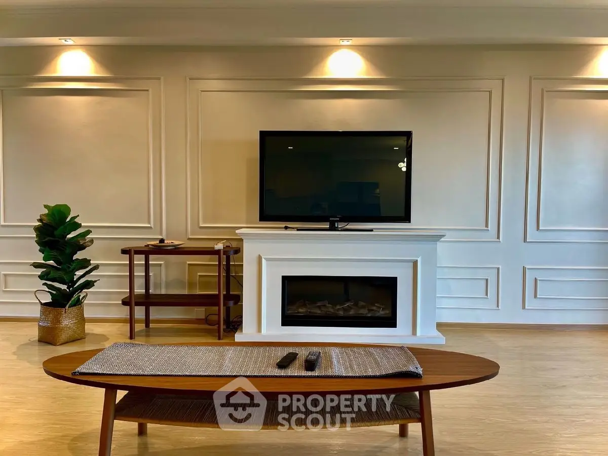 Elegant living room with modern TV setup and stylish decor