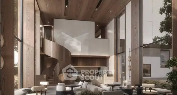 Luxurious modern living room with high ceilings and spiral staircase in elegant apartment.