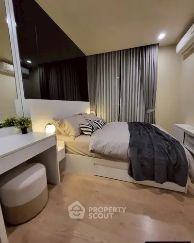 Cozy modern bedroom with stylish decor and ambient lighting