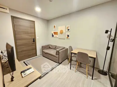 Modern living room with cozy sofa and stylish decor in a contemporary apartment.