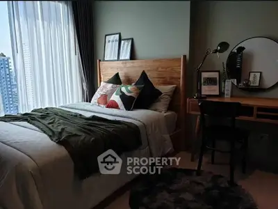 Cozy bedroom with modern decor and large window view