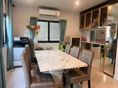 Modern dining room with marble table and elegant decor