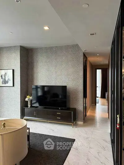 Modern living room with sleek TV setup and elegant decor