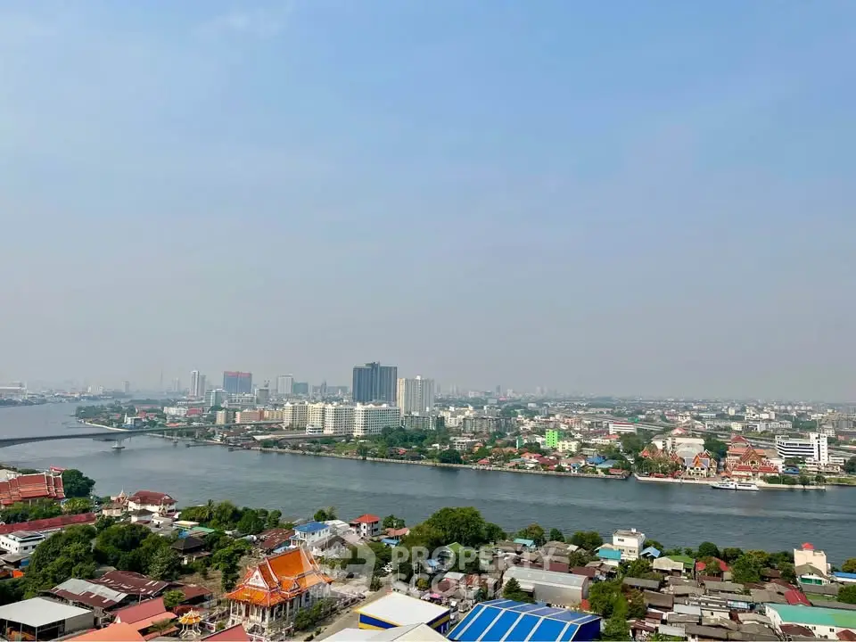 Stunning panoramic cityscape view with river and skyline, ideal for urban living enthusiasts.