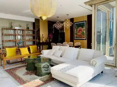 Luxurious living room with elegant decor and abundant natural light