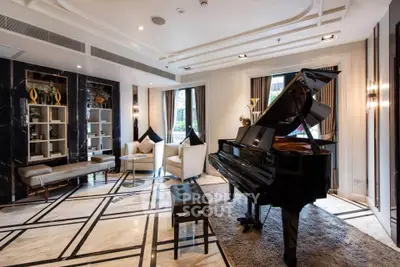 Luxurious living room with grand piano and elegant decor