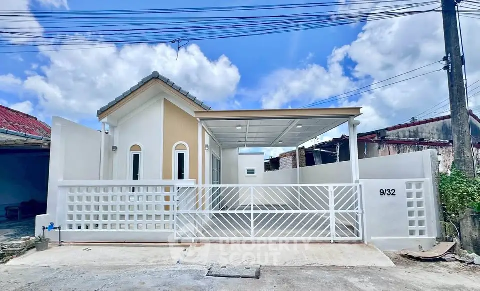 Charming single-story home with modern design and spacious driveway, perfect for family living.