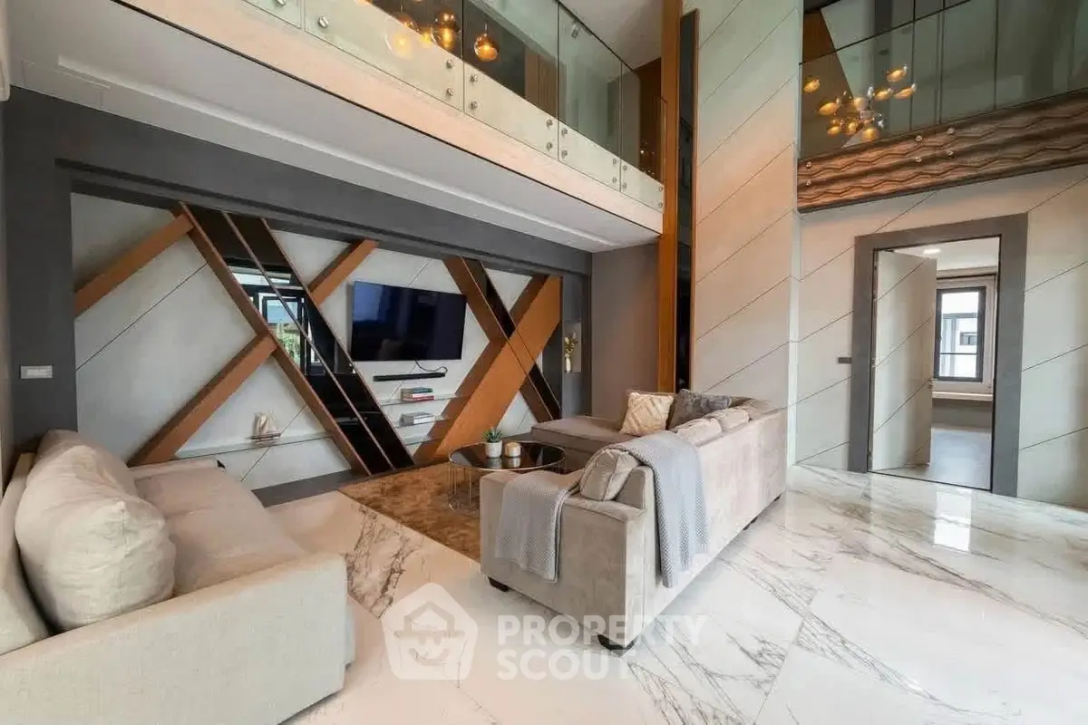 Luxurious modern living room with high ceilings and elegant decor