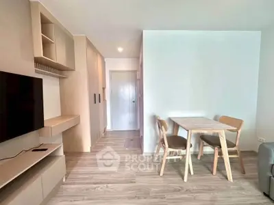 Modern living room with minimalist furniture and wooden flooring