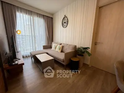 Cozy modern living room with stylish decor and natural light