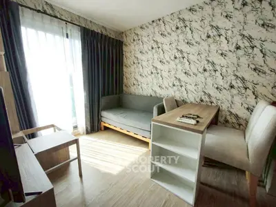 Cozy living room with modern decor and natural light