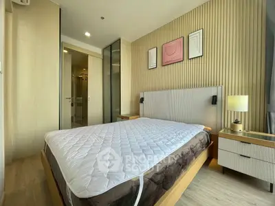 Modern bedroom with stylish decor and natural light