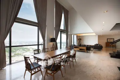 Luxurious high-rise apartment with panoramic city views and elegant modern interior design.