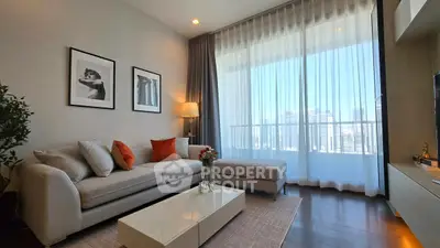 Modern living room with large windows and stylish decor