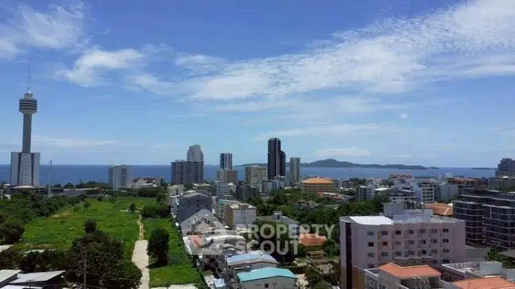 Stunning cityscape with ocean view and modern high-rise buildings