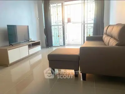 Modern living room with sleek furniture and natural light