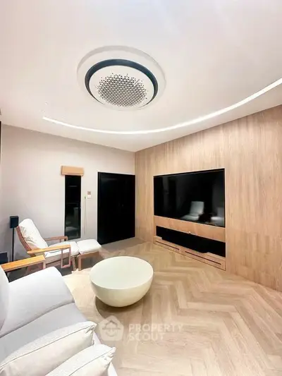 Modern living room with sleek wooden accents and stylish ceiling design