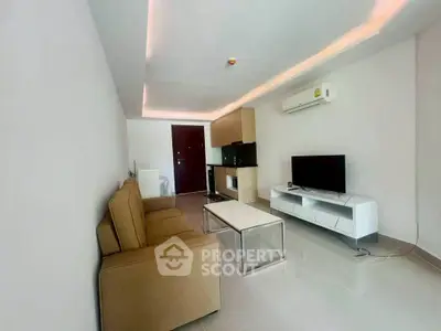 Modern living room with sleek furniture and ambient lighting