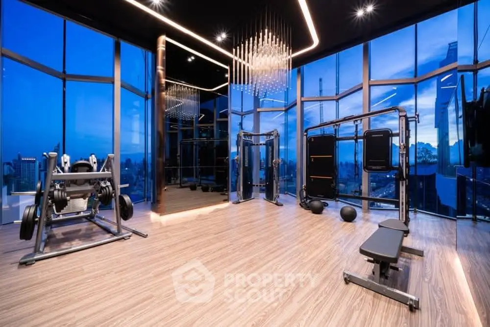 Luxurious high-rise gym with panoramic city views and modern equipment.